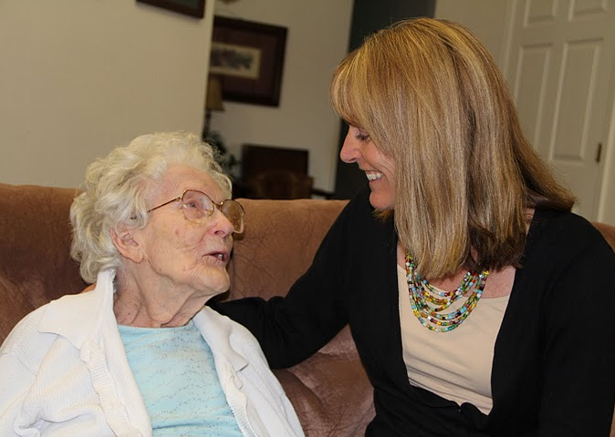 Home Page Letter - Pam and woman blue shirt side profiles